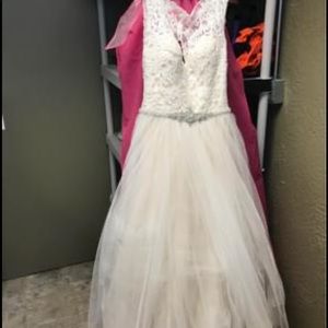 Bought Dress from Stephanis Bridal Boutique. Size 8 with alters. I am 5’3.